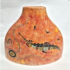 Red Triangle Vase featuring traditional Aboriginal art designs. Red Triangle Vase featuring traditional Aboriginal art designs.